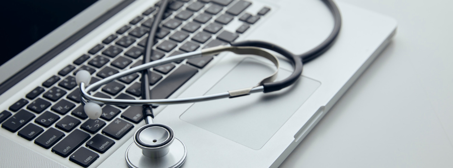 1 of 5, laptop and stethoscope